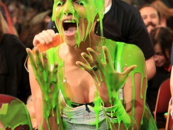 Woman with green goo on her