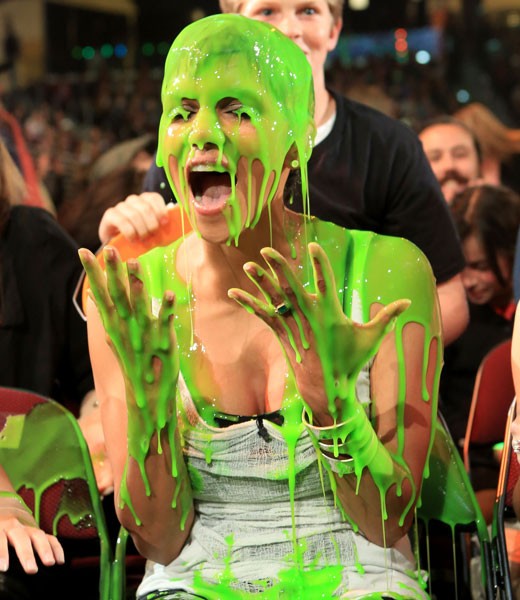 Woman with green goo on her