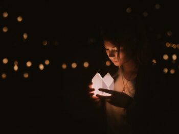 woman holding light
