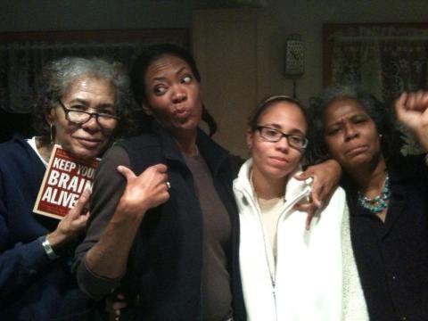 four women standing together, multigenerational